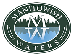 Logo of Manitowish Waters with the letter 'M' and evergreen trees.