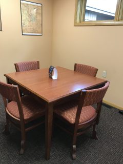 Rice creek room with 1 table and 4 chairs